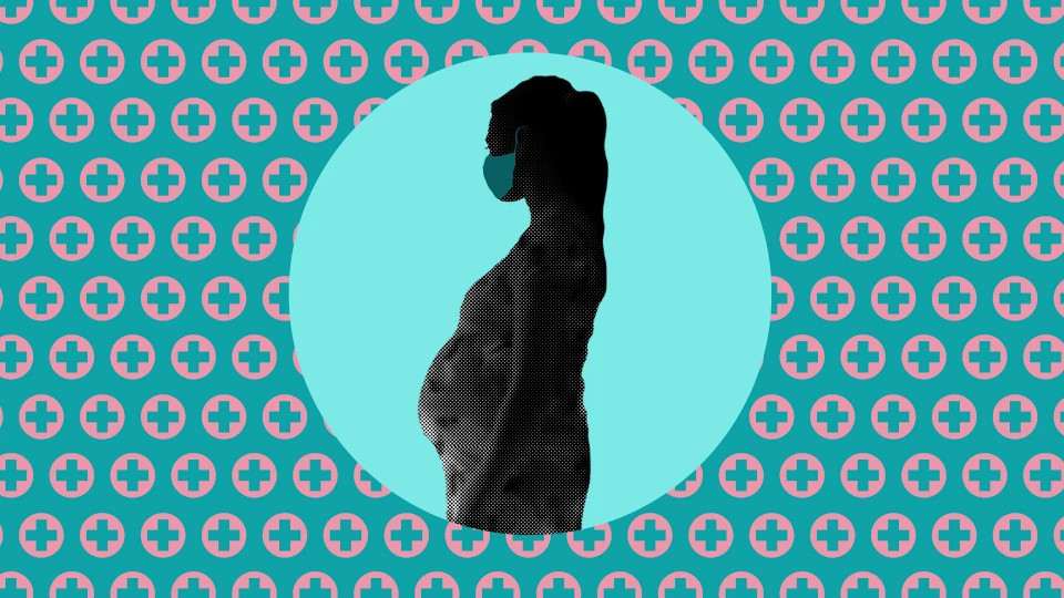 Pregnant woman wearing mask