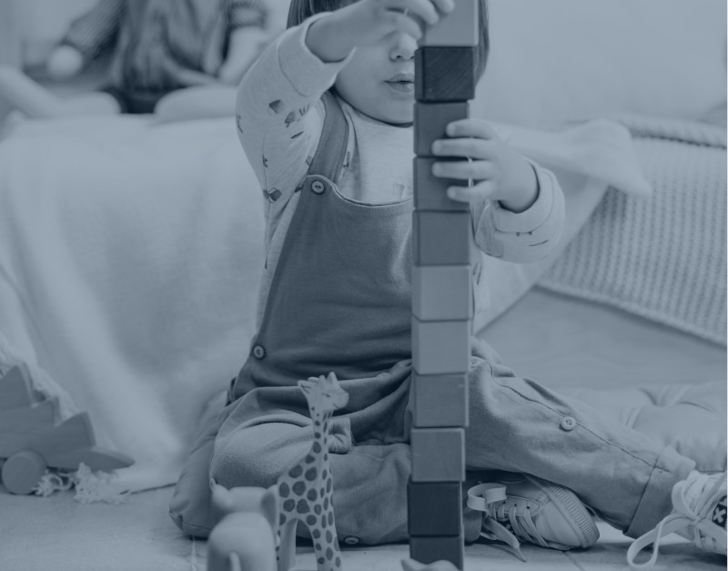 child playing with blocks.